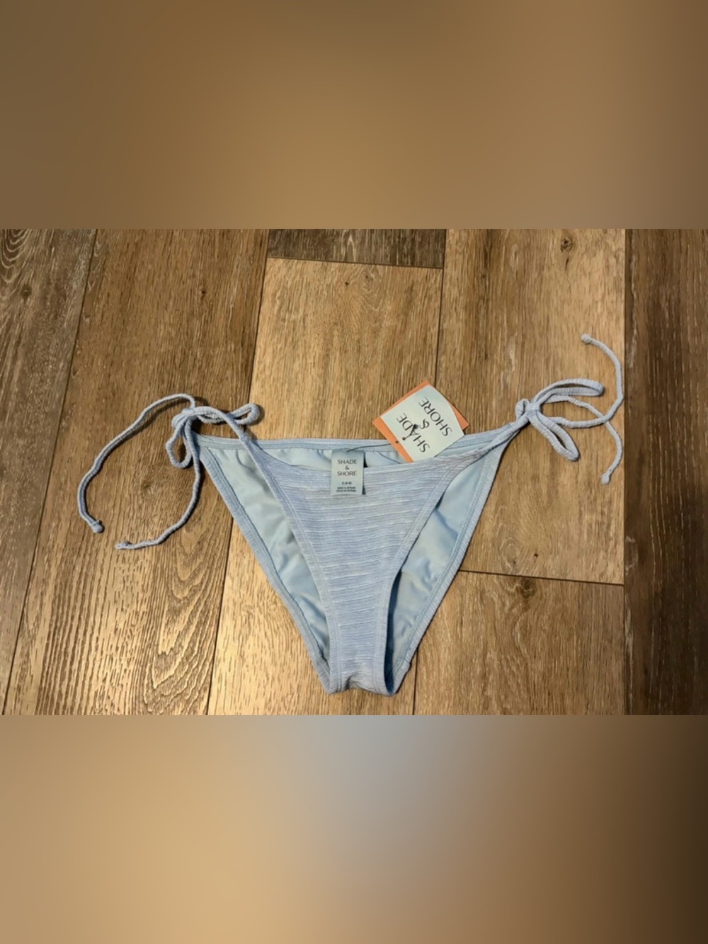 Shade & Shore light blue bikini bottoms with subtle horizontal stripes, size S
